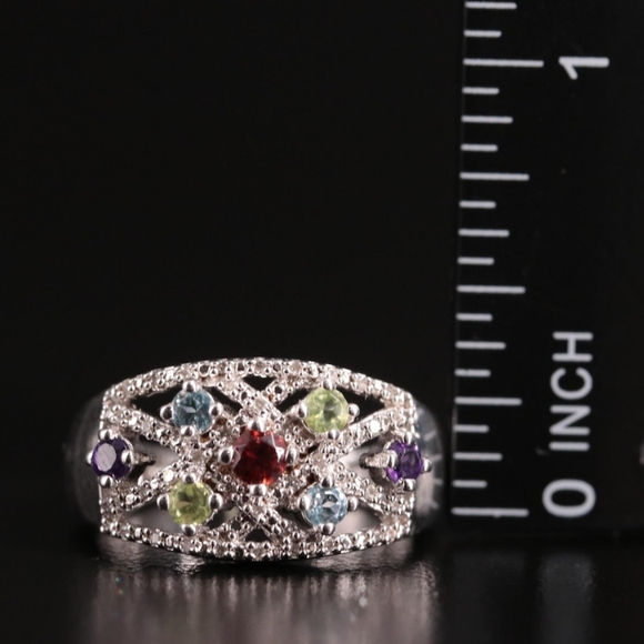 Sterling Silver Openwork Ring with Garnet, Blue Topaz, and Diamond Stone… - Picture 7 of 8